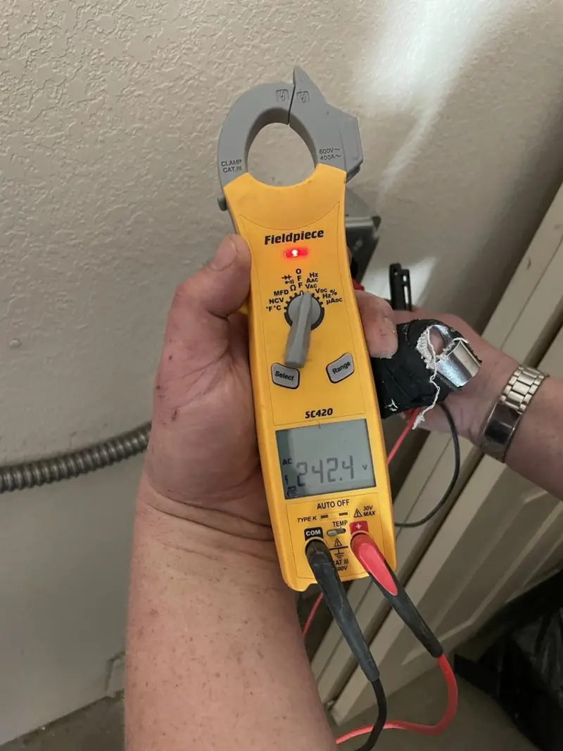 Voltage testing with clamp meter during Aluminum Wiring Replacement in Deer Park